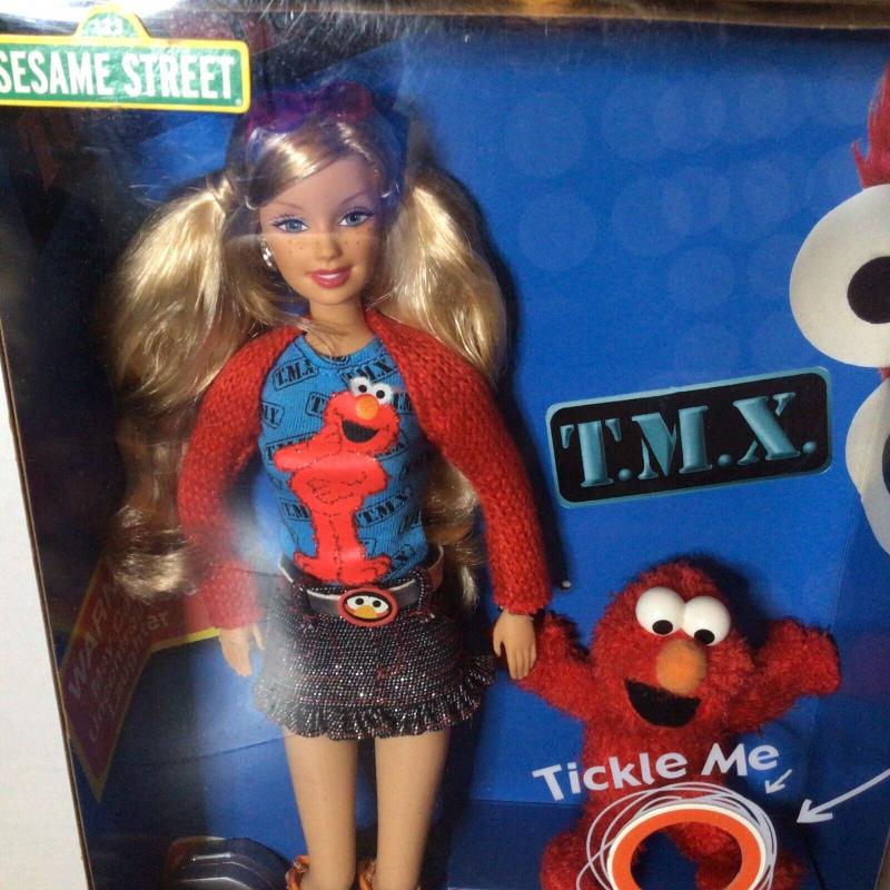 Barbie® Loves T.M.X.™ Elmo Doll - K5499 BarbiePedia