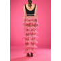 Black top with pink feathers skirt