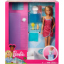 Barbie doll with bathroom furniture and accessories.