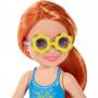 Barbie® Club Chelsea™ Doll, 6-inch Redhead Wearing Removable Emoji-Decorated Skirt and Flower-Shaped Sunglasses