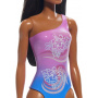 Beach Barbie Doll With Dark Brown Hair Wearing Tropical Purple Swimsuit